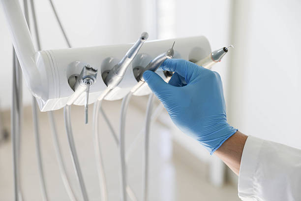 Professional Tooth Extraction technician working in Santa Fe Springs, CA